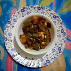 A picture of Potato and capsicum veg.