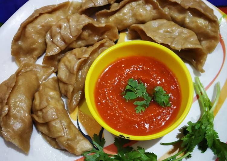 Steamed Wheat Momos Stuffed with Paneer and Veggies