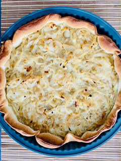 Une photo de Tarte à l’oignon, chèvre et miel