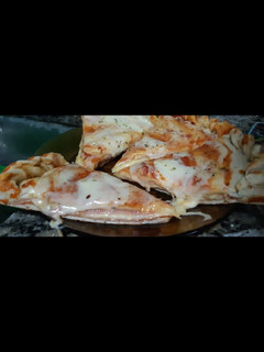 Una foto de Pizza rellena