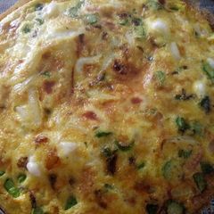 A picture of Asparagus and smoked scamorza frittata.
