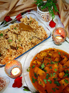 A picture of Chicken Shorba with Zeera rice.