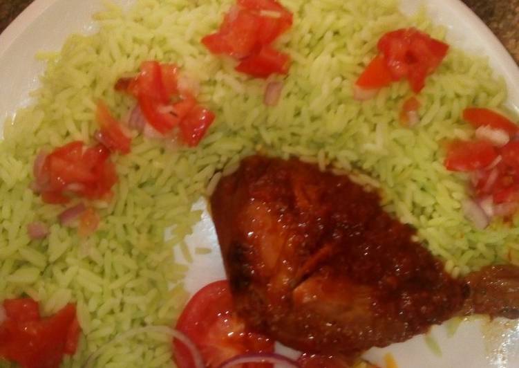 Colourd Rice with chicken stew and tomato's