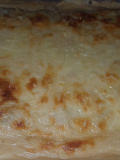 Una foto de Lasaña de espinacas champiñones y bacon