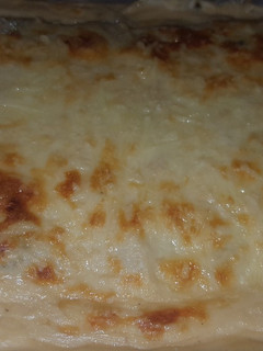 Una foto de Lasaña de espinacas champiñones y bacon