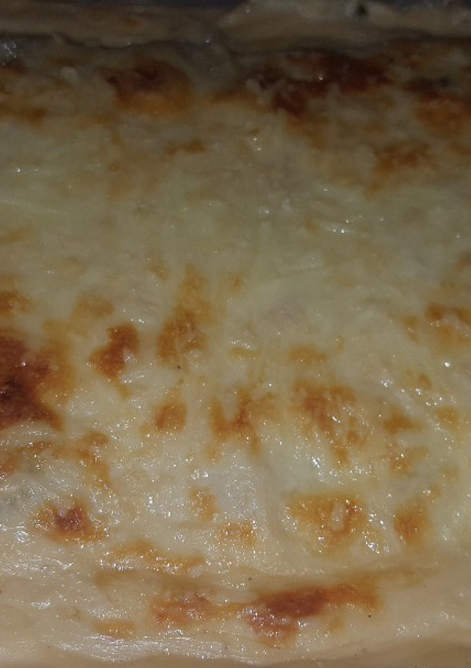 Una foto de Lasaña de espinacas champiñones y bacon