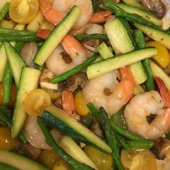 A picture of Shrimp and loaded vegetable scampi.