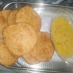 Aloo ki tarkari daal ki kachori k saath A picture of Aloo ki tarkari daal ki kachori k saath.