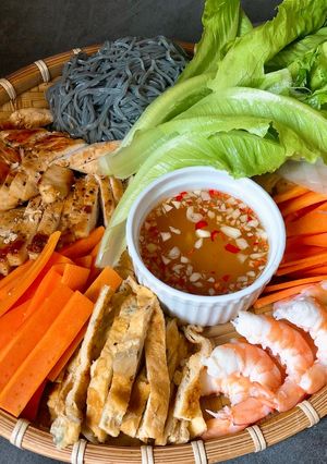 A picture of Shrimp, Chicken, Egg, Carrot, and Brown Rice Noodle Spring Rolls.