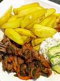 Baked potato wedges served with beef