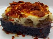 Una foto de coliflor morada con queso