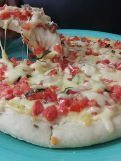 Una foto de Pizza Margarita-Margherita