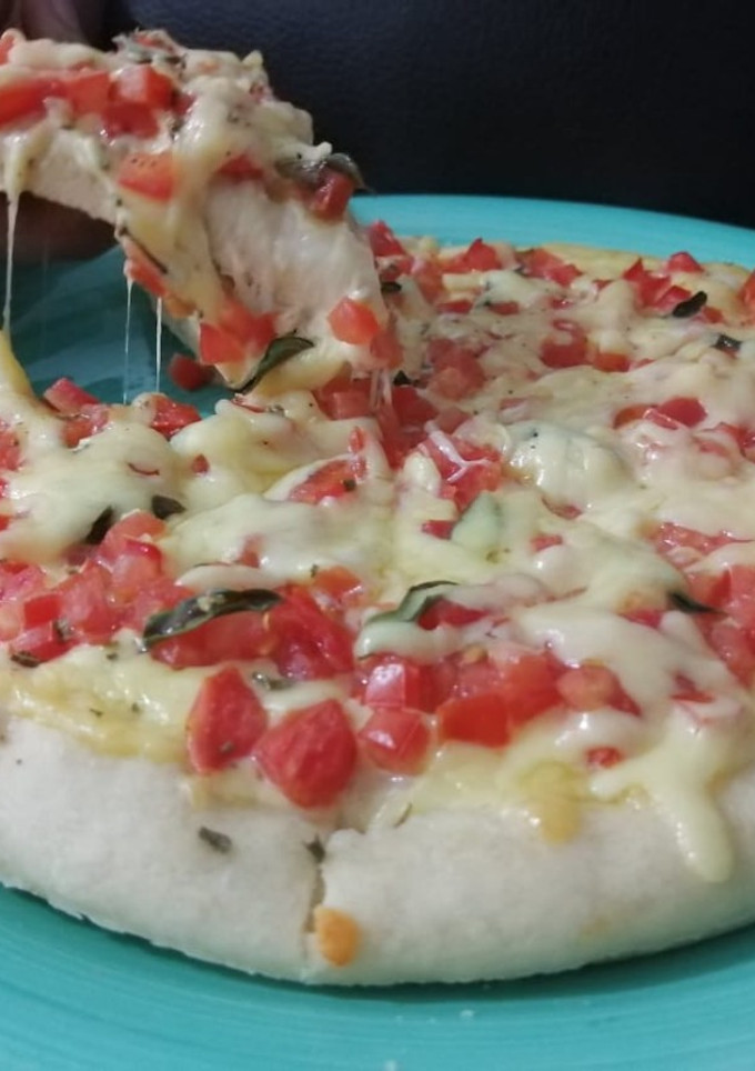 Una foto de Pizza Margarita-Margherita