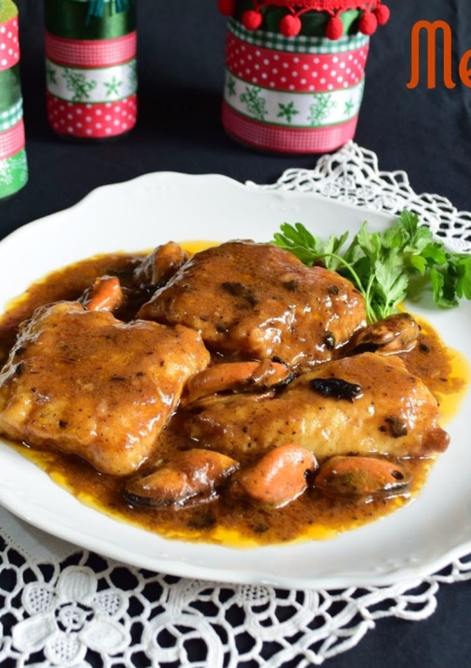 Una foto de Merluza con salsa de ajonegro
