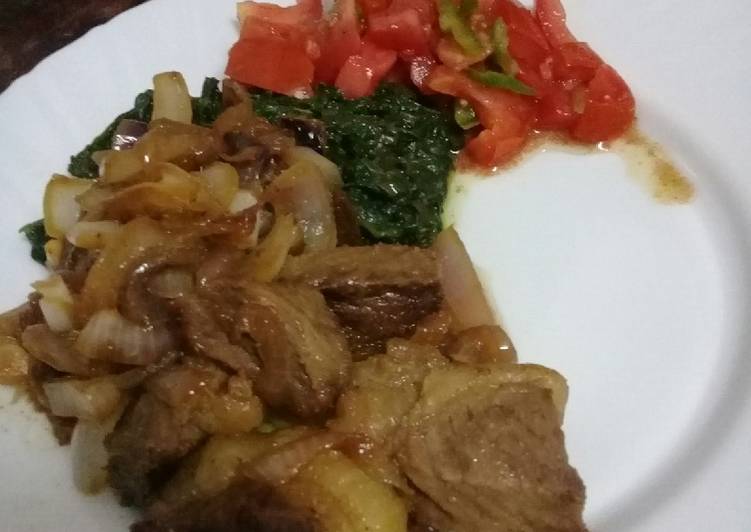 Fried beef with extra onions and kachumbari served with mto