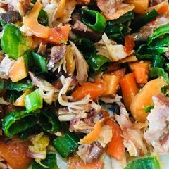 A picture of Shredded fish and veggies.
