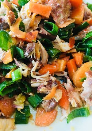 A picture of Shredded fish and veggies.