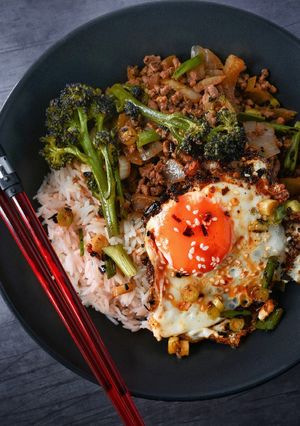 A picture of Soy & Ginger Beef Rice Bowl With Chilli Egg.