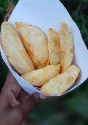 A picture of Cumin and garlic infused potato wedges.