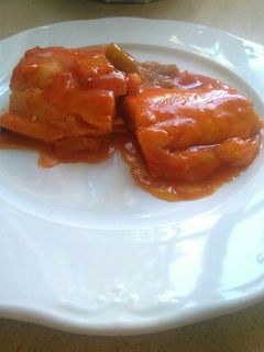 Una foto de Bacalao con pimiento y tomate