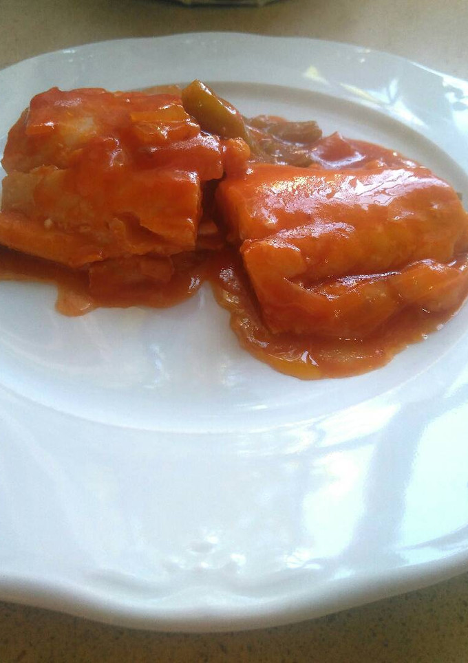 Una foto de Bacalao con pimiento y tomate