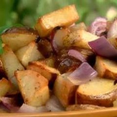 A picture of Rosted Potatoes with Sausage and Vegetables.