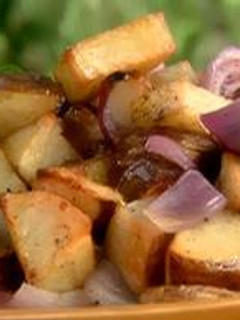 A picture of Rosted Potatoes with Sausage and Vegetables.