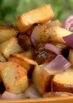 A picture of Rosted Potatoes with Sausage and Vegetables.
