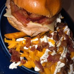 A picture of 1/2 lb Turkey pepper jack sandwich && loaded fries 🍟 🥓 🧀.