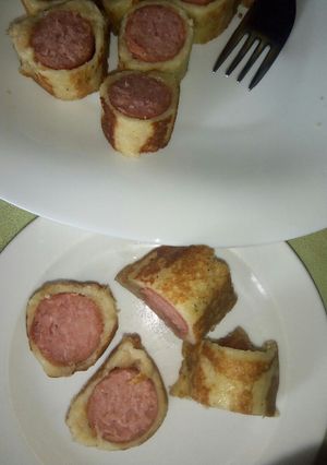 A picture of Sausage rolled in french toast bites.