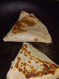 Una foto de Empanadas de pollo mandarín con masa de fajitas :)