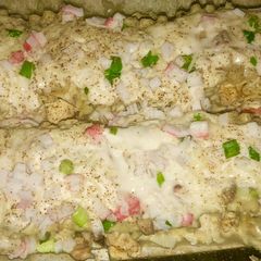 A picture of Chicken & crab Alfredo lasagna roll ups.