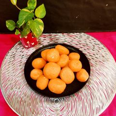 A picture of Komola Bhog Bengali Sweets.
