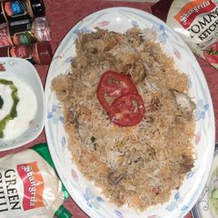 A picture of Chicken green chilli biryani.