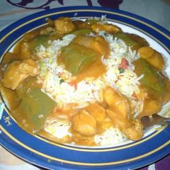 A picture of Chicken shashlik with fried rice.