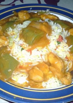 A picture of Chicken shashlik with fried rice.