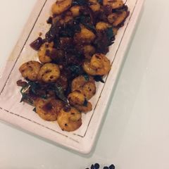 A picture of Shrimp in black pepper sauce.