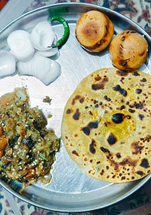 A picture of Sattu parantha with bharta.