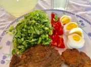 Una foto de milanesas de carne al horno