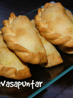 Una foto de Empanadillas de puerro con nueces al curry