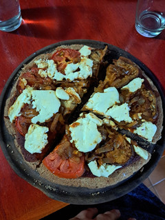 Una foto de Pizza integral saludable