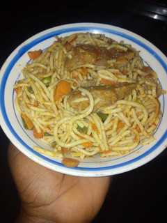 A picture of Spagetti with biscuit bone.