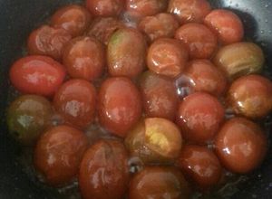 Una foto de Tomates cherris salteados