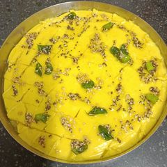 A picture of Khandvi Bites (Gujarati Breakfast).