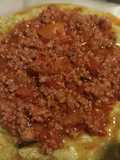 Polenta Verde con Queso y Salsa Bologñesa