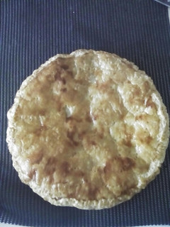 Una foto de Empanada de hojaldre de jamón y queso