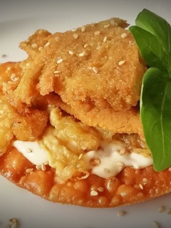 Una foto de Pincho de alcachofas empanadas