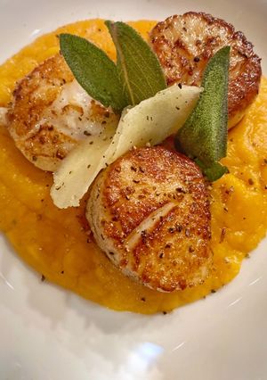 A picture of Seared Scallops with Root Vegetable.