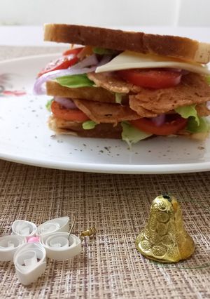 A picture of Chicken salami sandwich.