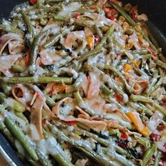 A picture of Fried Green Beans with Ham & Radish Greens.